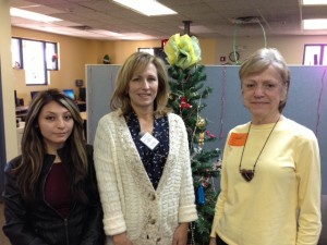 Lola, Marti and Lauri helped connect adopters to the Adopt-a-Family program so that more than 400 families in need received gifts and meals for Christmas.