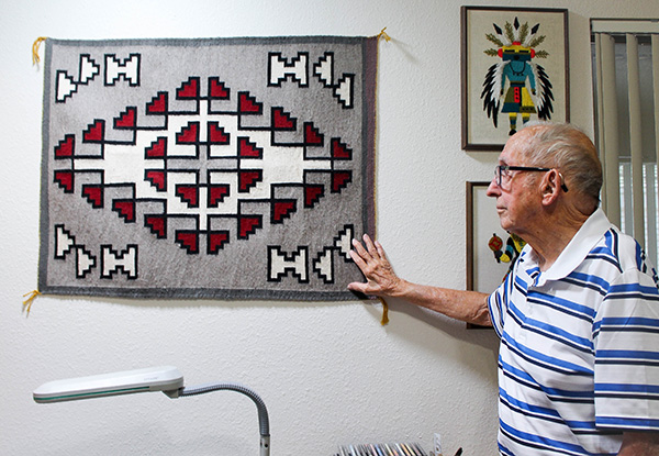 Evan displays his favorite Navajo wall hanging