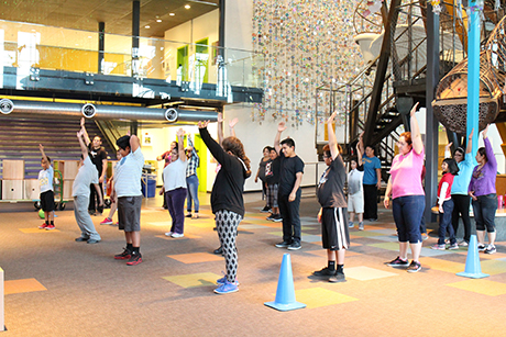 Families participate in Family Wellness Program exercise class