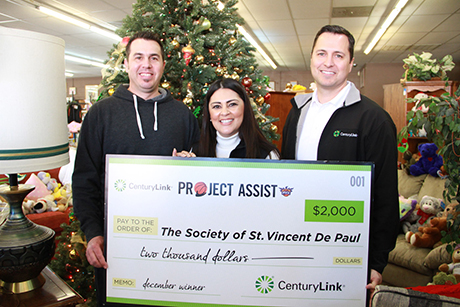 CenturyLink presents check at Palomino Christmas event