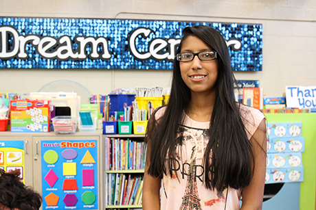 Dream Center thrift store manager Jennifer poses for a photo.