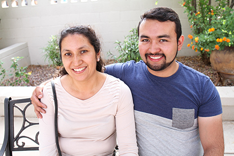 Jose and his mother, Laura Ortega, pose for a photo at SVdP.