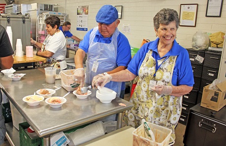 Pete and Ersie Salcido scooping ice cream