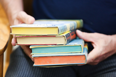 Close up photo of vintage books being sold at an SVdP thrift store