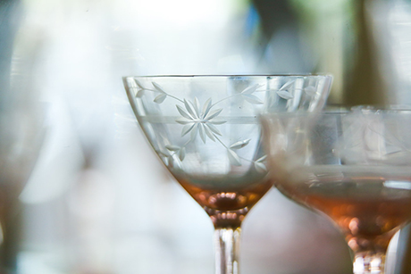 Close up photo of crystal glasses being sold in an SVdP thrift store