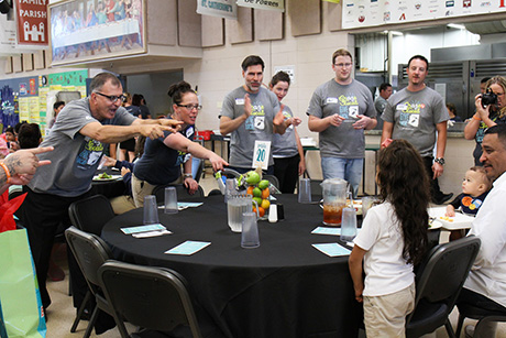 Wildflower Bread Co. CEO Louis Basile and other staff members sing Happy Birthday to a dining room guest during their Kitchen Takeover.