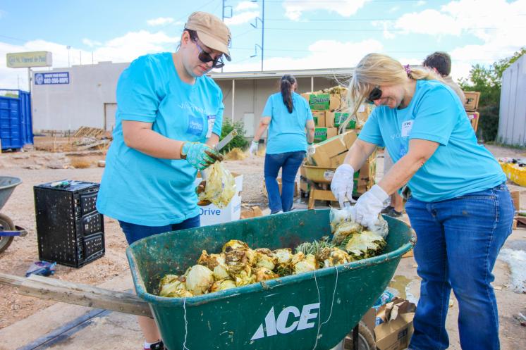 Charles Schwab volunteers at SVdP Urban Farm