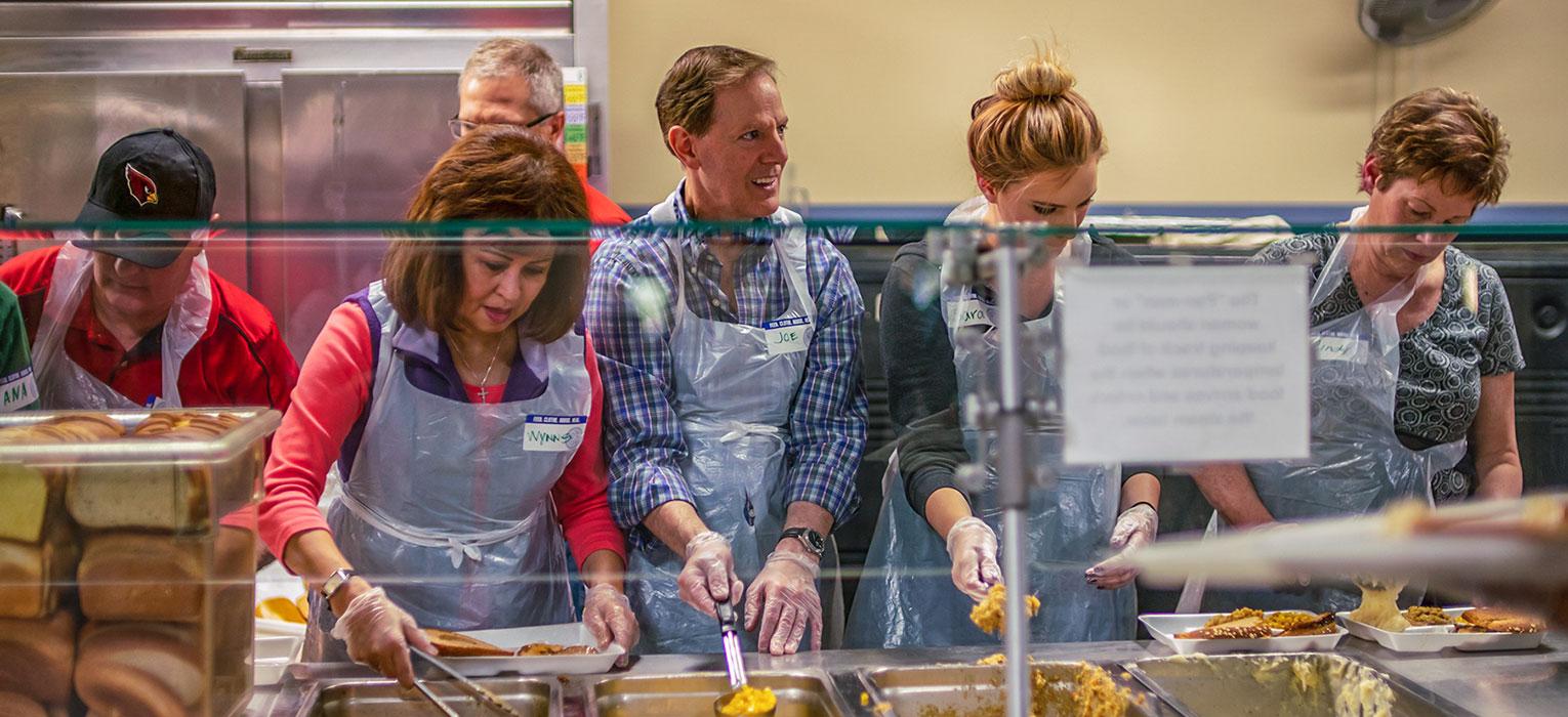 Serving Thanksgiving meal at SVdP's Phoenix Dining Room