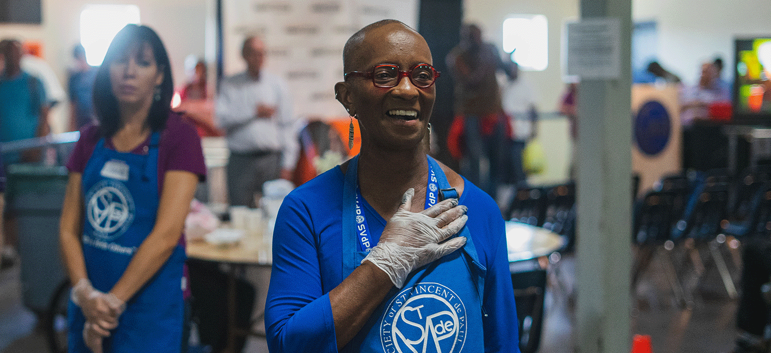 Volunteer serving at SVdP's Phoenix Dining Room