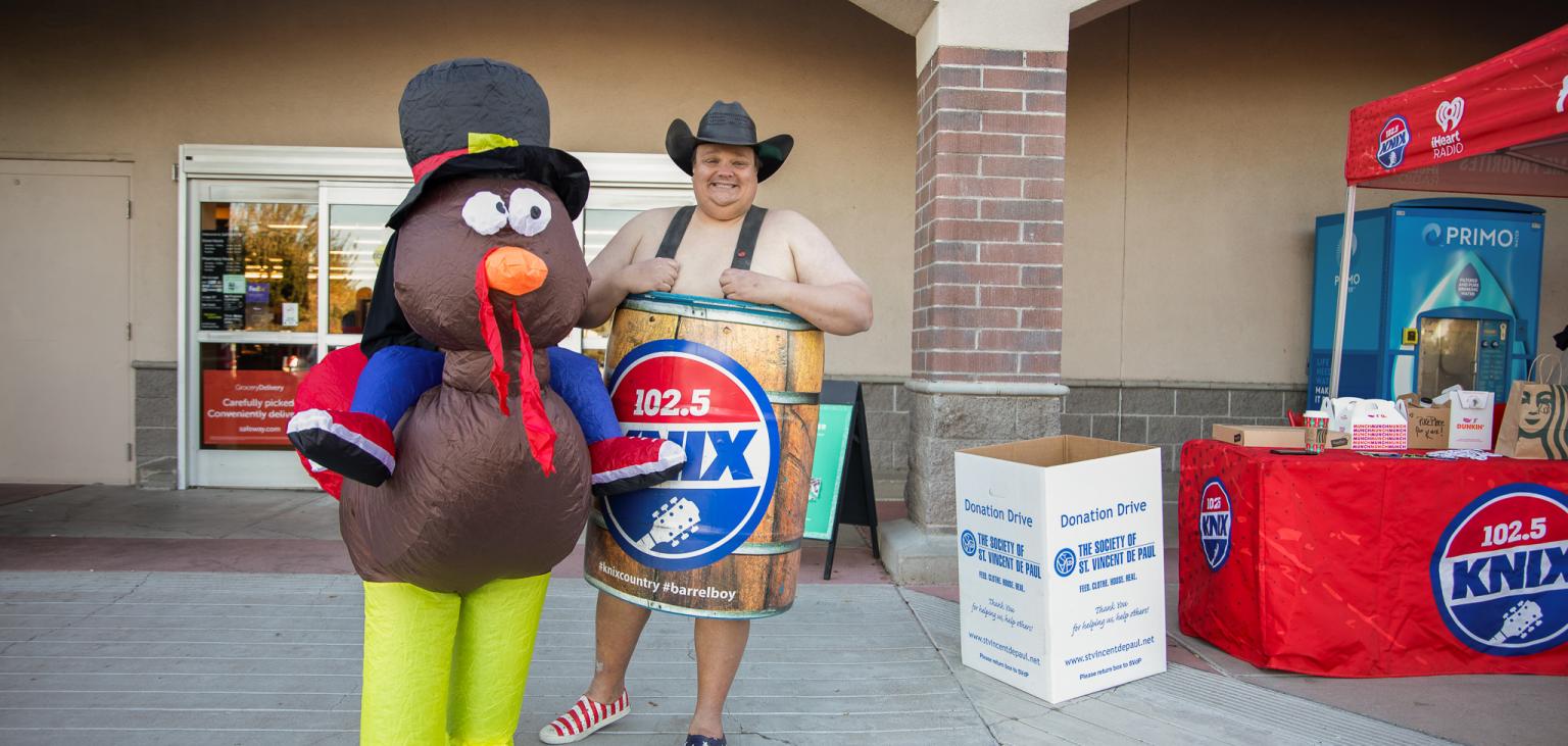 Our friends from KNIX pose for a photo at the Feed the Valley kickoff.