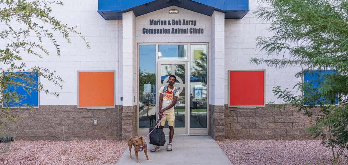 A resident stands in front of the new CAP Clinic.