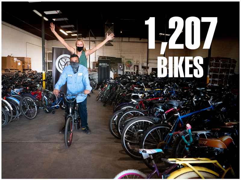 Community Drives Manager Emily Radawec and Bike Shop Manager Frank Villegas