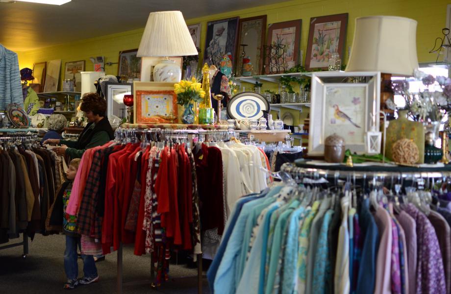 Racks of thrift store clothing