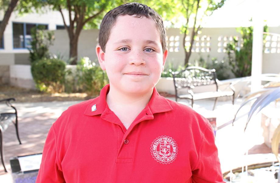 Adrien poses for a photo at SVdP's main campus.