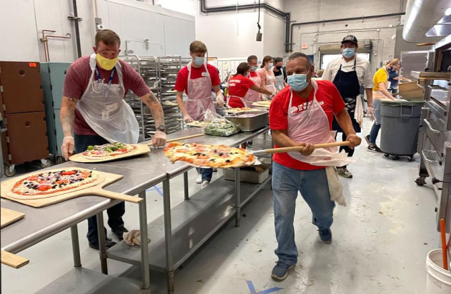 Friday Night Pizza returns to SVdP for the first time since the COVID-19 pandemic began.
