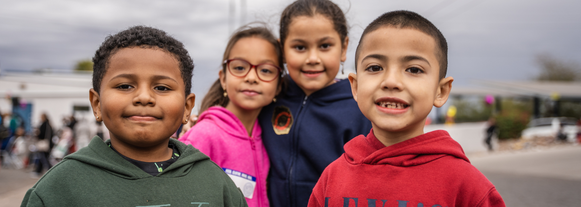 024d-campaign-header Group of children standing outside