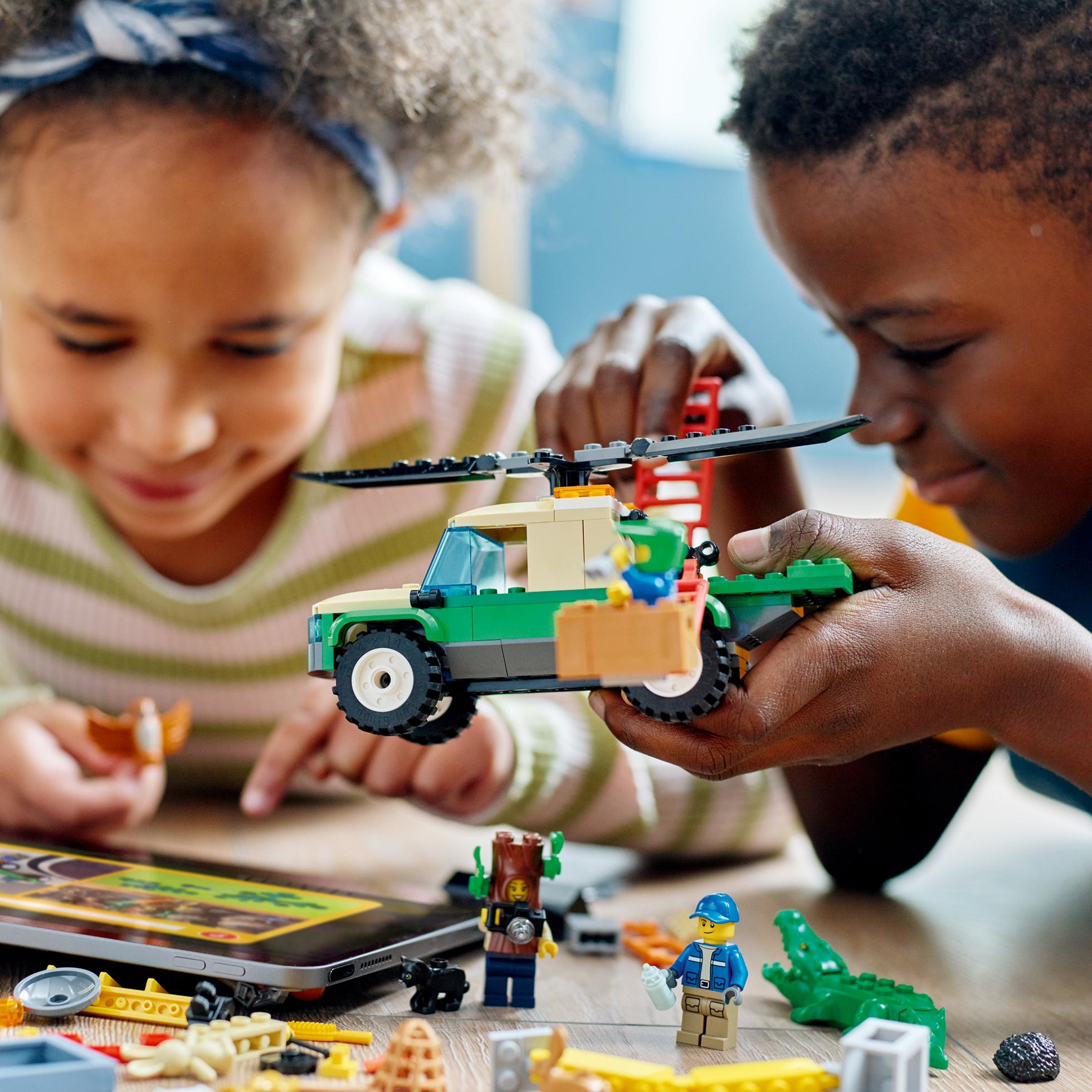 kids playing with a LEGO set