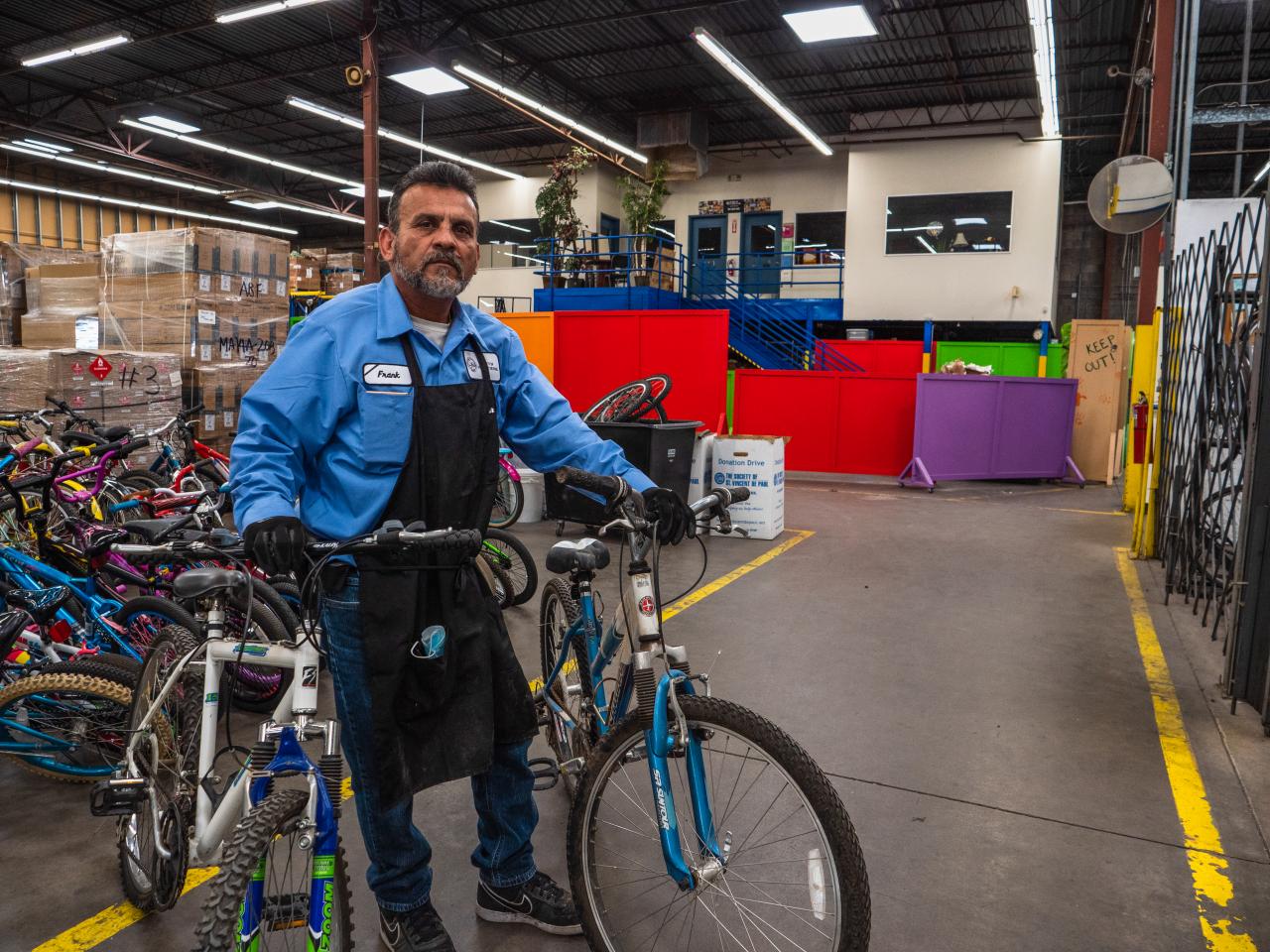 Frank with the bikes in the bike shop