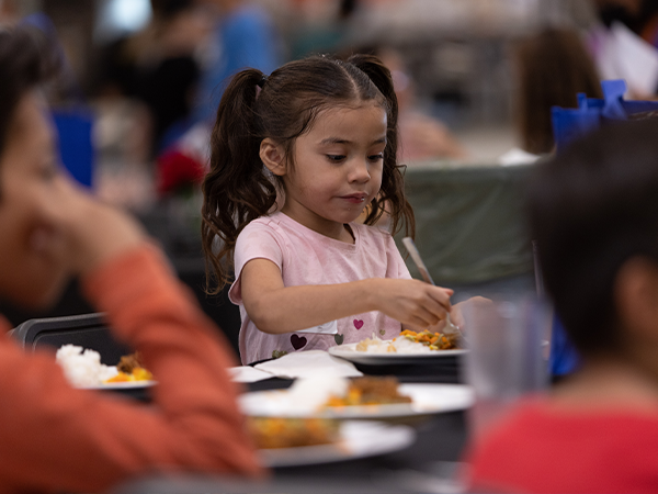 little girl eating food