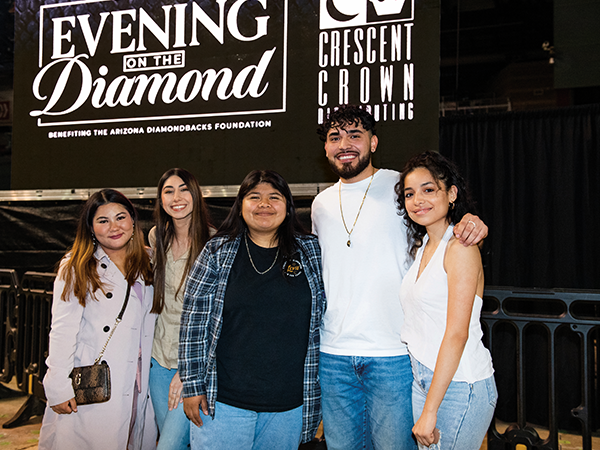 five students standing together at the Diamondbacks Evening on the Diamond event