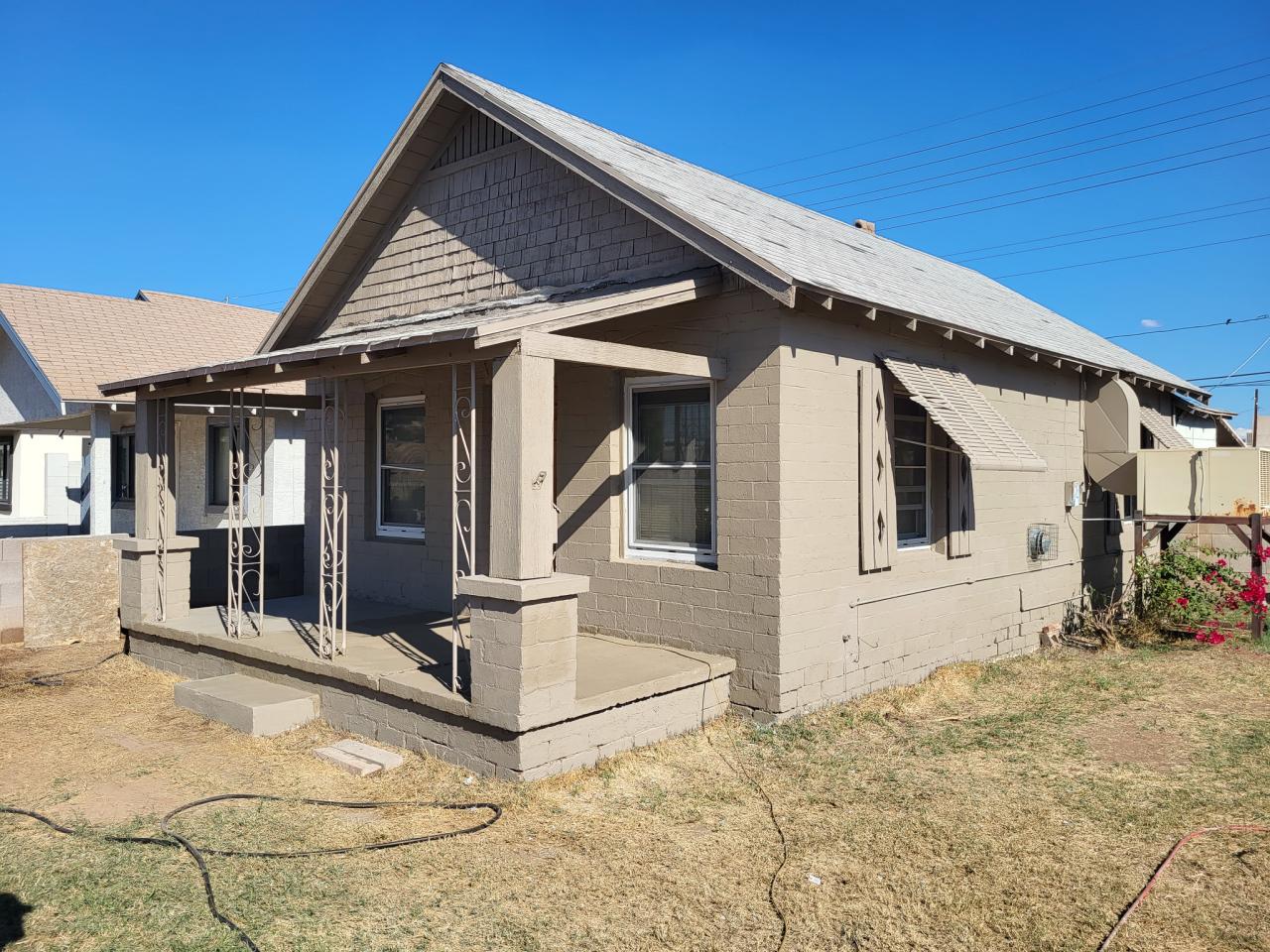 John Harper's house stands newly repainted.