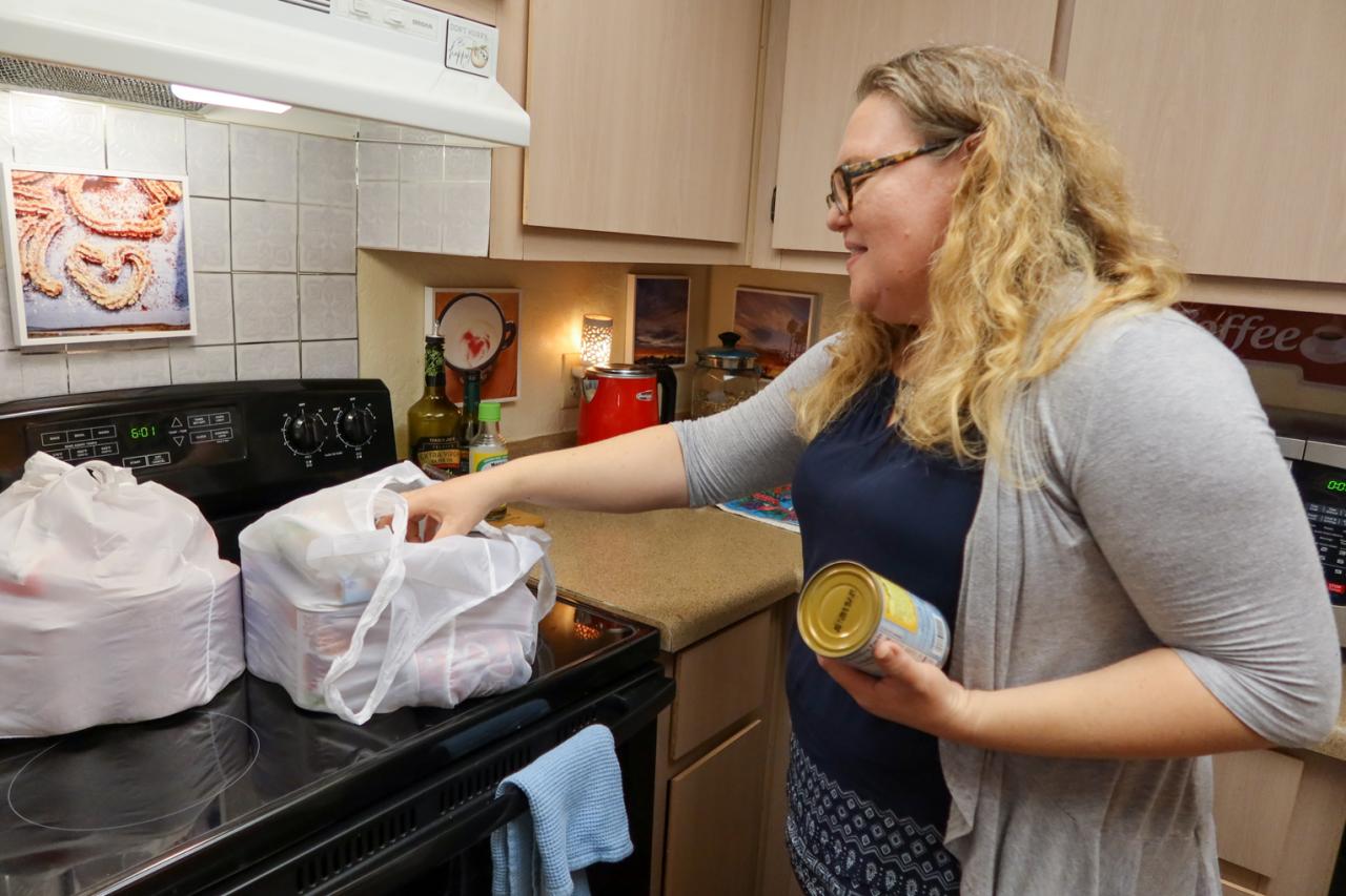 Sarah and groceries bags