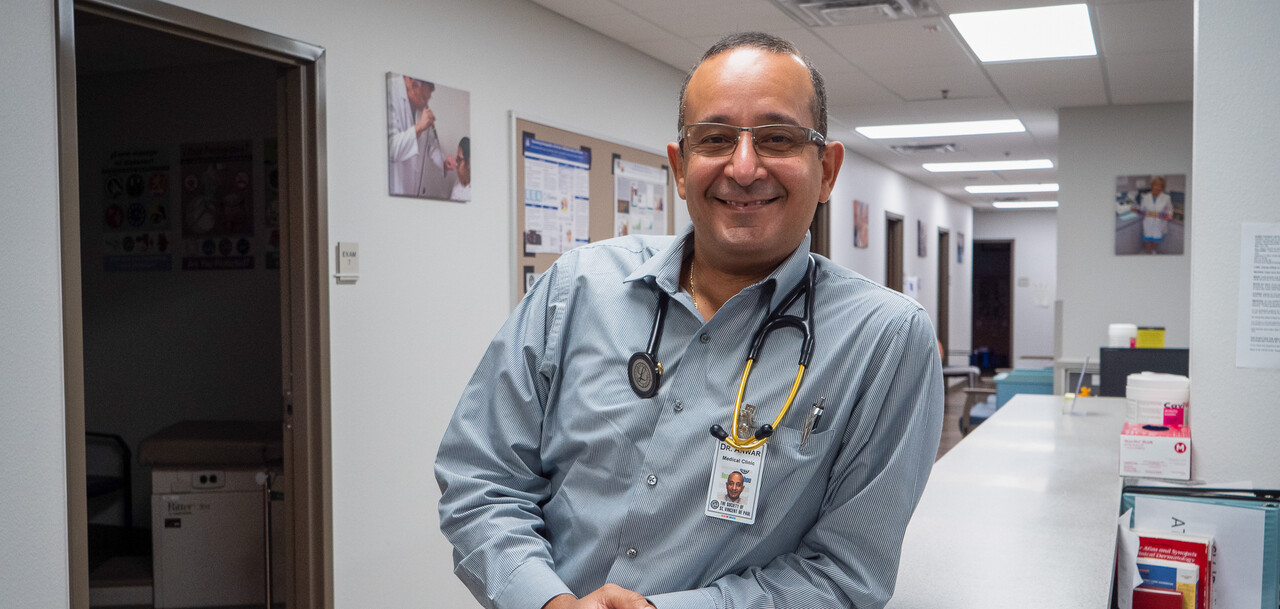 Dr. Anwar poses in the medical clinic.