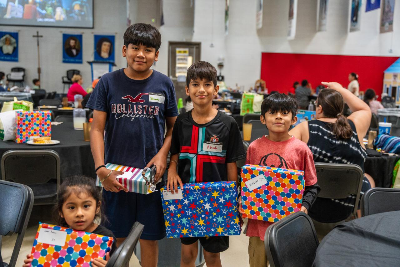 A group poses with their Lego sets.