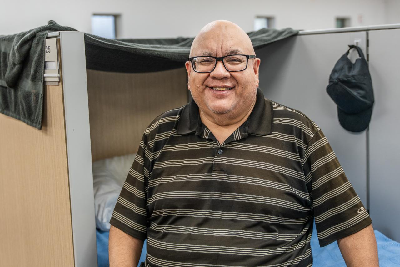 Abraham sits in his space in Rosalie's Place.