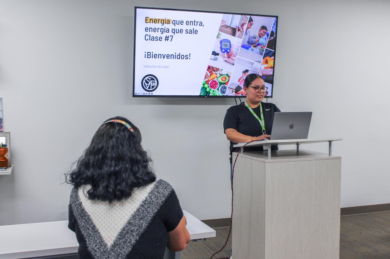 Maria attends a class at the Center for Family Wellness.