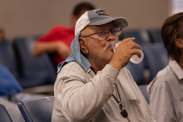 Man drinking a bottle of water